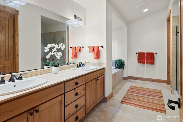 80 Queens Loop, Cle Elum, WA 98922 - full bath with a stall shower, double vanity, tile patterned flooring, and a garden tub
