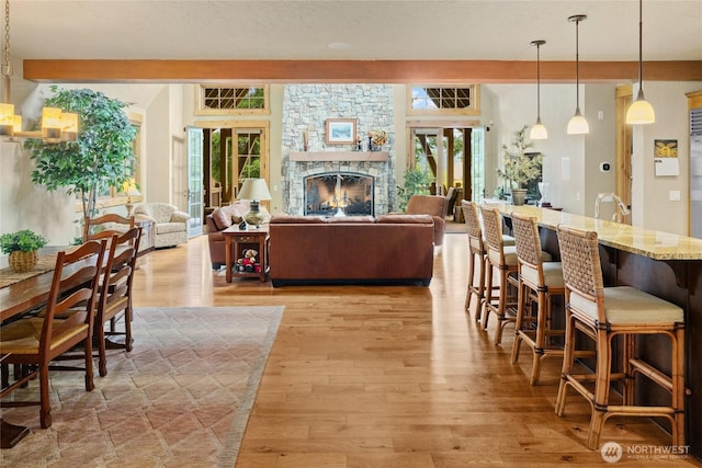 80 Queens Loop, Cle Elum, WA 98922 - living area featuring light wood finished floors and a stone fireplace