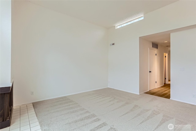 7435 Old Redmond Rd Unit 325, Redmond, WA 98052 - spare room featuring light carpet and baseboards