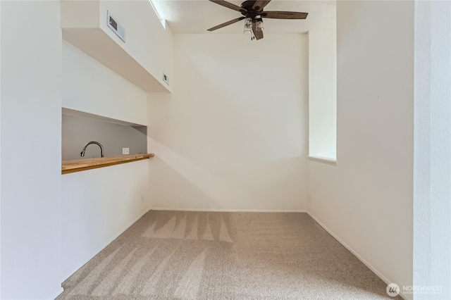 7435 Old Redmond Rd Unit 325, Redmond, WA 98052 - unfurnished room with carpet floors and a ceiling fan