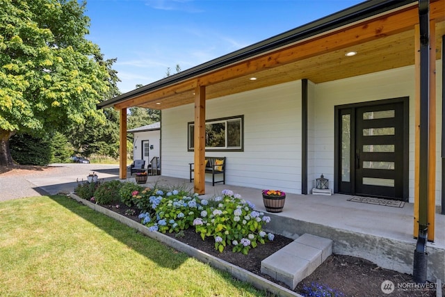 2403 E Hemmi Rd, Bellingham, WA 98226 - entrance to property featuring covered porch and a yard
