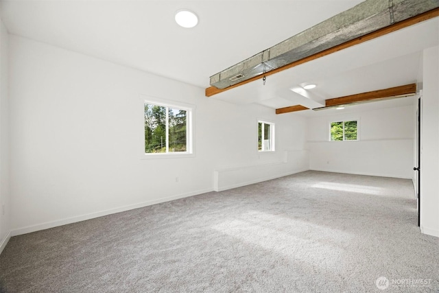 2403 E Hemmi Rd, Bellingham, WA 98226 - carpeted spare room featuring baseboards and beamed ceiling