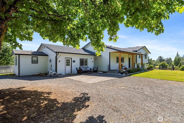 2403 E Hemmi Rd, Bellingham, WA 98226 - view of front of property featuring a patio area, a front lawn, and driveway