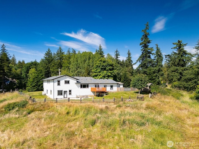 2403 E Hemmi Rd, Bellingham, WA 98226 - view of front of house featuring a wooded view and a wooden deck