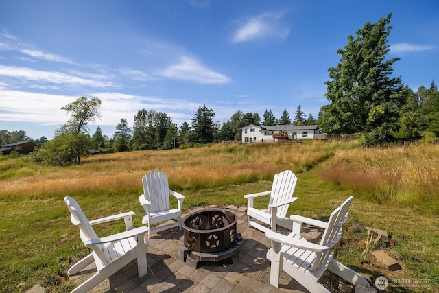 2403 E Hemmi Rd, Bellingham, WA 98226 - view of patio featuring an outdoor fire pit