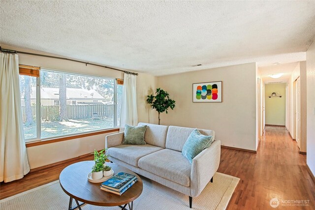 5428 172nd St SW, Lynnwood, WA 98037 - living room with wood finished floors and a textured ceiling