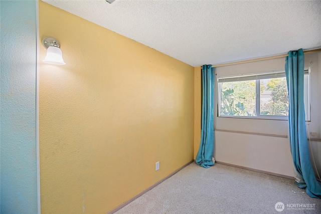 5428 172nd St SW, Lynnwood, WA 98037 - unfurnished room with a textured ceiling and carpet flooring