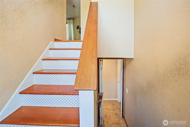 5428 172nd St SW, Lynnwood, WA 98037 - stairway with a textured wall and baseboards