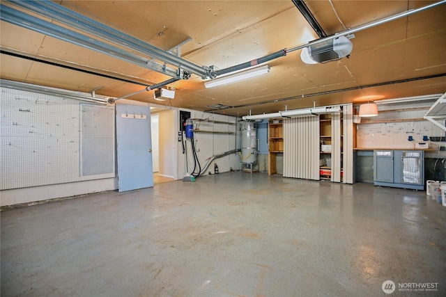 5428 172nd St SW, Lynnwood, WA 98037 - garage with secured water heater and a garage door opener