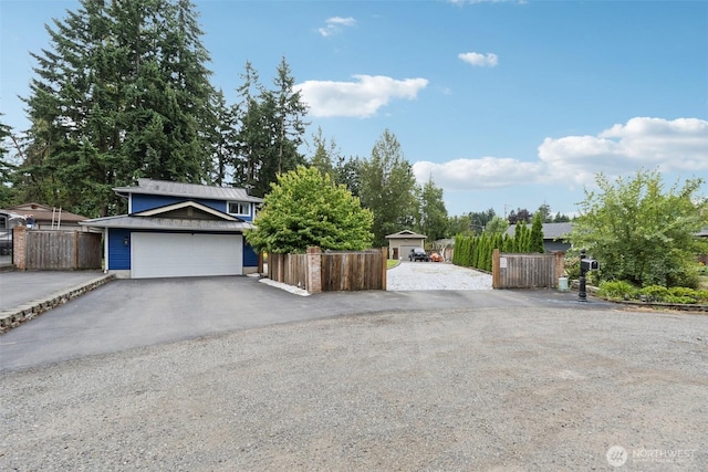 5502 82nd Street Ct E, Puyallup, WA 98371 - view of front of home featuring driveway and a garage