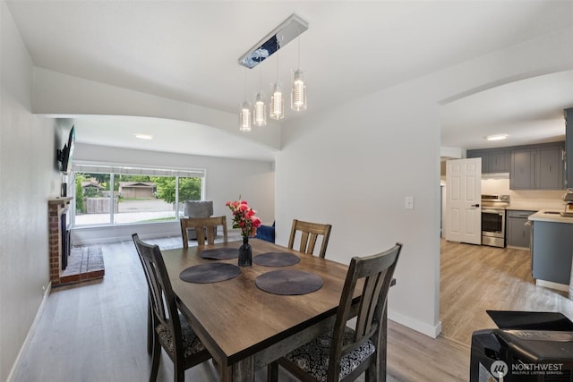 5502 82nd Street Ct E, Puyallup, WA 98371 - dining space with light wood-type flooring and baseboards