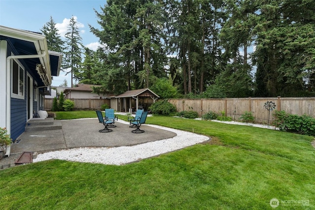 5502 82nd Street Ct E, Puyallup, WA 98371 - fenced backyard with a patio