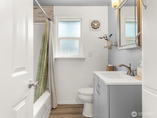 8839 S Yakima Ave, Tacoma, WA 98444 - bathroom featuring vanity, wood finished floors, and shower / tub combo with curtain