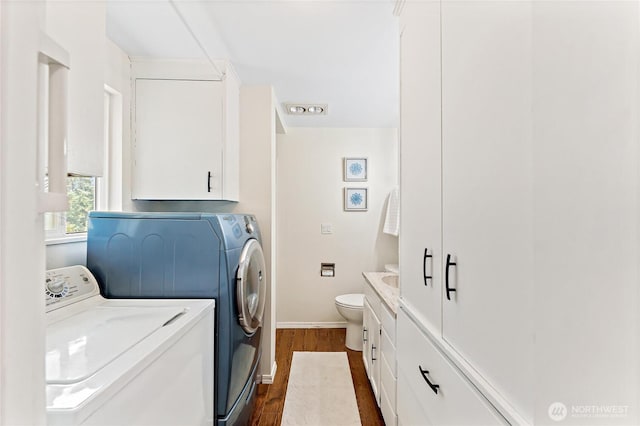 22720 90th Ave W, Edmonds, WA 98026 - laundry room featuring independent washer and dryer and dark wood-type flooring