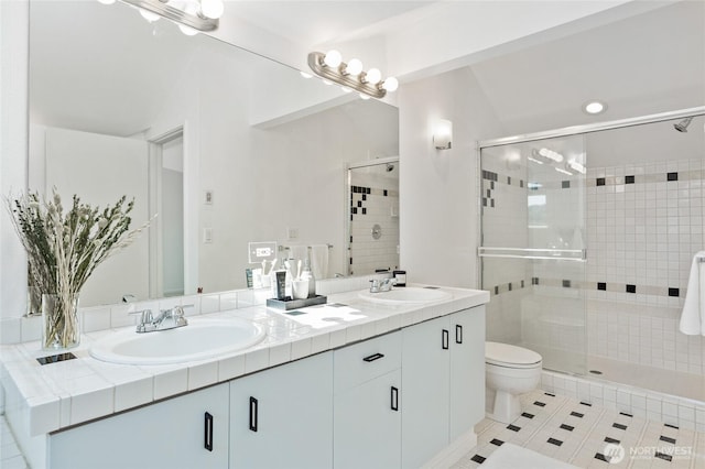 1926 Fairview Ave E Unit 307, Seattle, WA 98102 - full bathroom with double vanity, a shower stall, and lofted ceiling