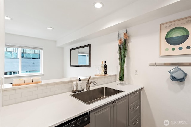 1926 Fairview Ave E Unit 307, Seattle, WA 98102 - kitchen with gray cabinets, light countertops, recessed lighting, and dishwashing machine