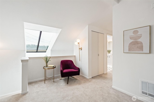 1926 Fairview Ave E Unit 307, Seattle, WA 98102 - sitting room with carpet flooring and vaulted ceiling