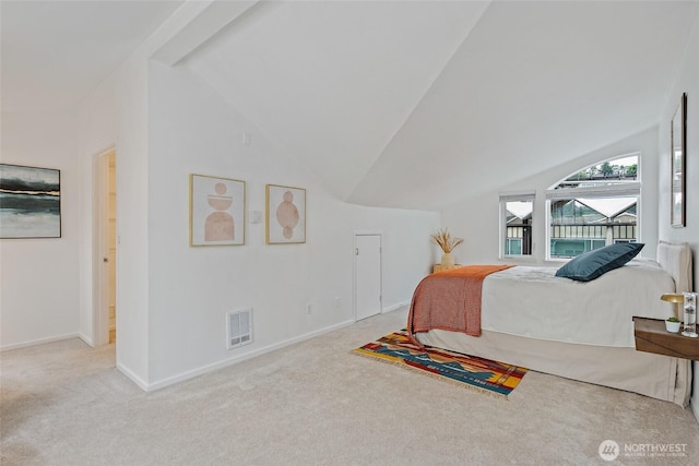 1926 Fairview Ave E Unit 307, Seattle, WA 98102 - carpeted bedroom with lofted ceiling and baseboards