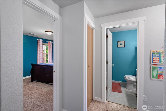 1222 Cora St SE, Lacey, WA 98503 - bathroom featuring toilet and baseboards