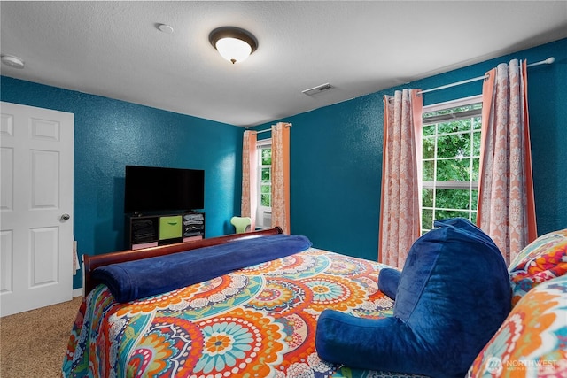 1222 Cora St SE, Lacey, WA 98503 - carpeted bedroom with a textured wall and a textured ceiling