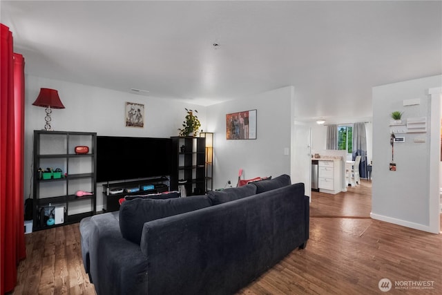 1222 Cora St SE, Lacey, WA 98503 - living area featuring wood finished floors and baseboards