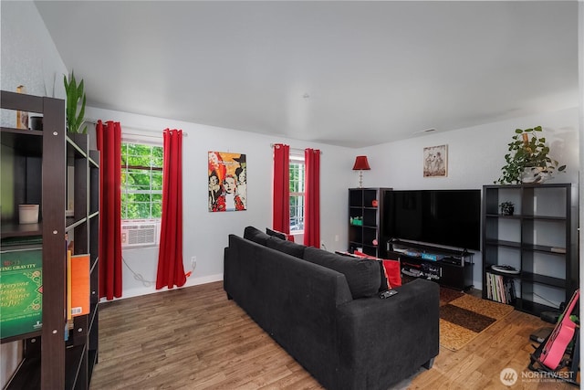 1222 Cora St SE, Lacey, WA 98503 - living room with wood finished floors, healthy amount of natural light, and cooling unit