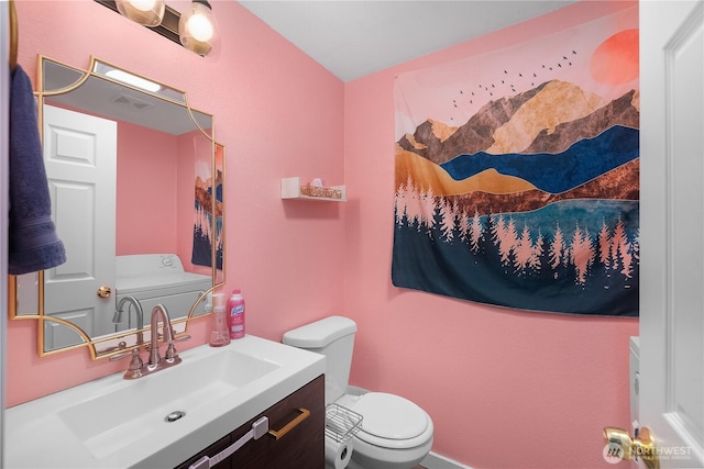 1222 Cora St SE, Lacey, WA 98503 - bathroom featuring washer / clothes dryer and vanity