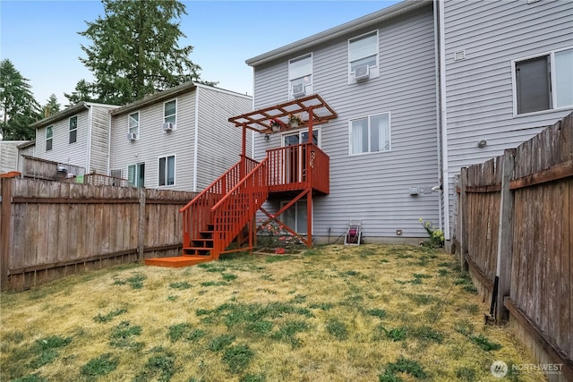 1222 Cora St SE, Lacey, WA 98503 - back of house with a fenced backyard, stairway, and a wooden deck