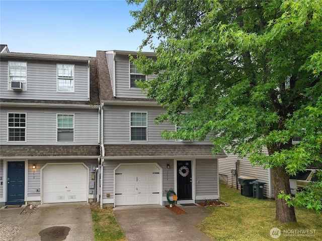 1222 Cora St SE, Lacey, WA 98503 - traditional home featuring driveway, an attached garage, and roof with shingles