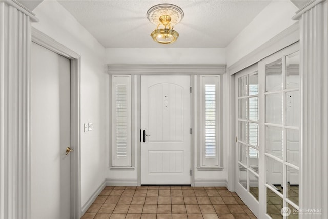 3322 Pacific Way, Longview, WA 98632 - entrance foyer featuring light tile patterned floors and a textured ceiling
