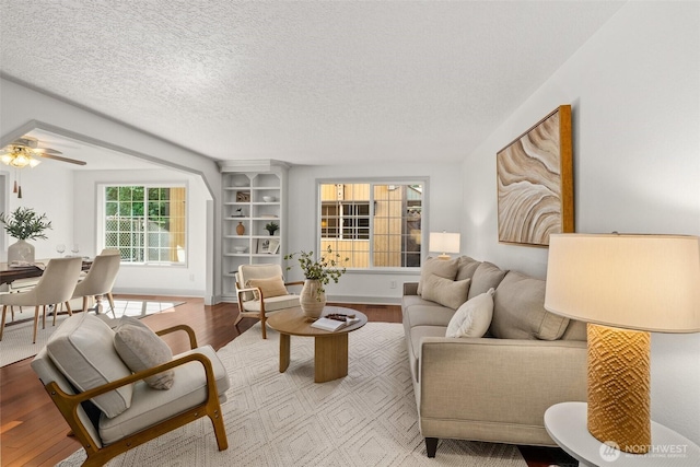 3322 Pacific Way, Longview, WA 98632 - living area with wood finished floors, a textured ceiling, and a ceiling fan