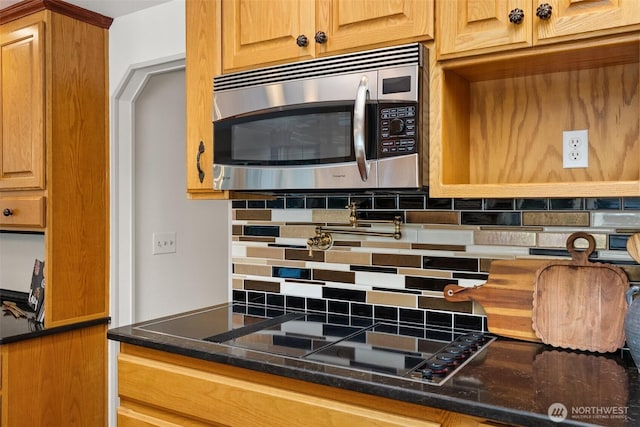 3322 Pacific Way, Longview, WA 98632 - kitchen featuring stainless steel microwave, tasteful backsplash, and dark stone countertops
