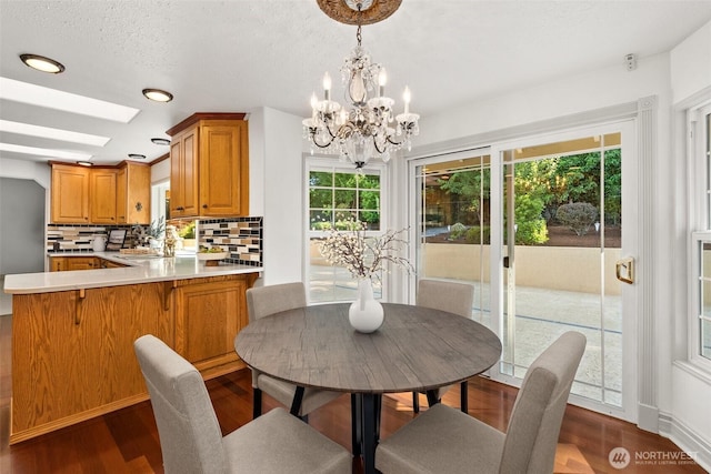3322 Pacific Way, Longview, WA 98632 - dining area featuring a chandelier, dark wood-style flooring, and recessed lighting