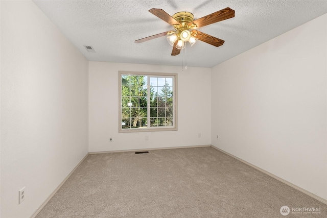 3322 Pacific Way, Longview, WA 98632 - empty room with carpet flooring, ceiling fan, and a textured ceiling