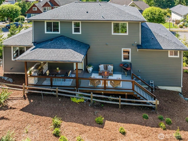 921 Whitewater Dr, Bellingham, WA 98229 - back of house featuring a shingled roof, outdoor lounge area, and a deck