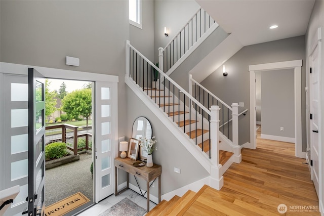 921 Whitewater Dr, Bellingham, WA 98229 - stairway with wood finished floors and a towering ceiling