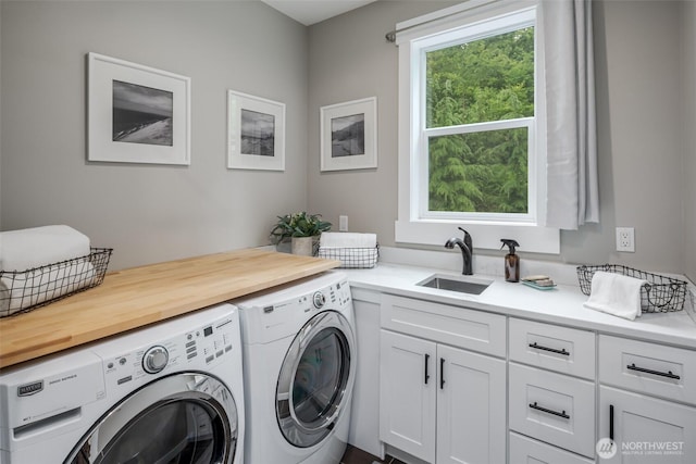 921 Whitewater Dr, Bellingham, WA 98229 - washroom with washing machine and dryer and cabinet space