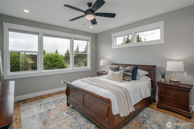 921 Whitewater Dr, Bellingham, WA 98229 - bedroom with wood finished floors, a ceiling fan, and recessed lighting