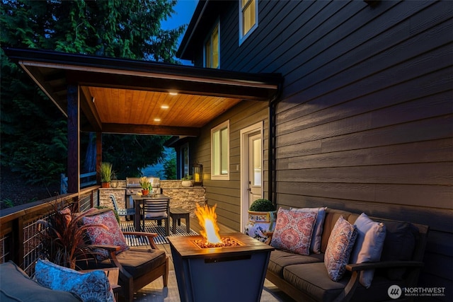 921 Whitewater Dr, Bellingham, WA 98229 - view of patio with an outdoor living space with a fire pit