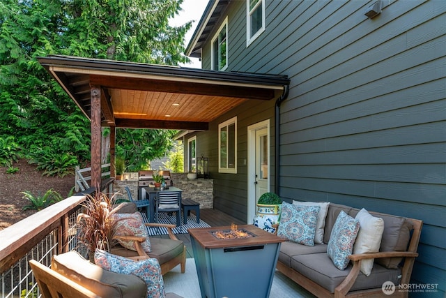 921 Whitewater Dr, Bellingham, WA 98229 - wooden terrace featuring an outdoor living space with a fire pit