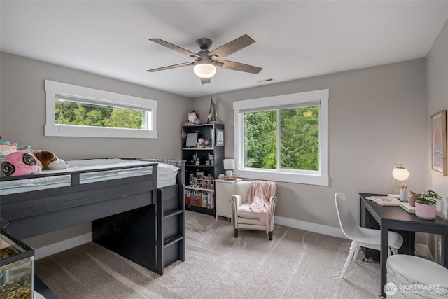 921 Whitewater Dr, Bellingham, WA 98229 - bedroom featuring multiple windows, light carpet, and a ceiling fan