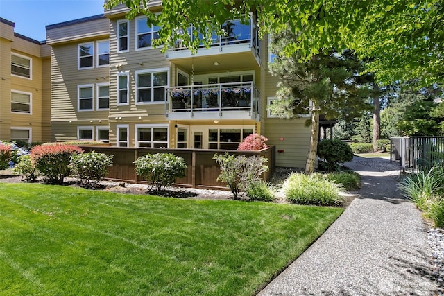 22910 90th Ave W Unit C103, Edmonds, WA 98026 - rear view of house featuring a balcony