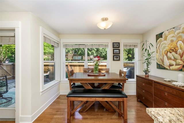 22910 90th Ave W Unit C103, Edmonds, WA 98026 - dining space featuring wood finished floors and baseboards