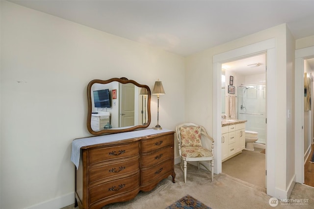 22910 90th Ave W Unit C103, Edmonds, WA 98026 - bedroom featuring ensuite bathroom and light carpet