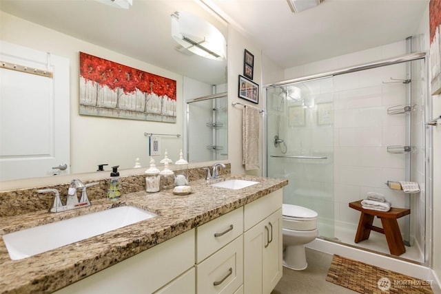 22910 90th Ave W Unit C103, Edmonds, WA 98026 - bathroom featuring a stall shower and double vanity