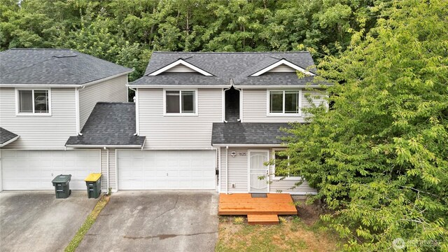 1625 Lincoln St, Bellingham, WA 98229 - traditional-style home with driveway, a shingled roof, and an attached garage