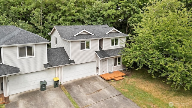 1625 Lincoln St, Bellingham, WA 98229 - traditional-style home featuring an attached garage, roof with shingles, driveway, and a deck