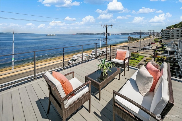 1706 Alki Ave SW Unit A, Seattle, WA 98116 - deck with a water view and an outdoor living space
