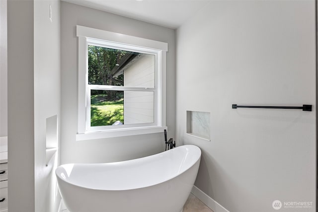 821 174th Ave NW, Lakebay, WA 98349 - bathroom featuring a freestanding bath and vanity