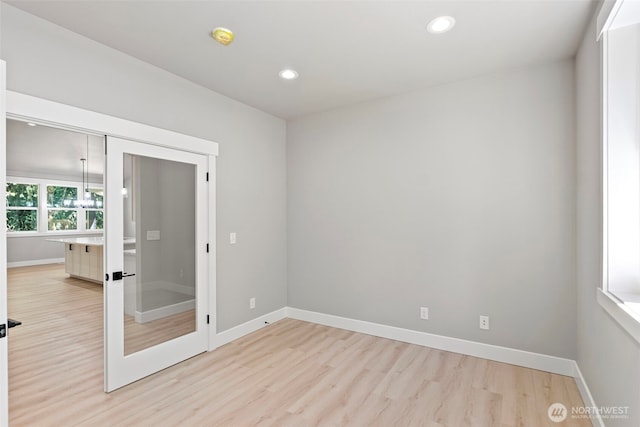 821 174th Ave NW, Lakebay, WA 98349 - empty room featuring light wood-style floors, recessed lighting, and a smoke detector